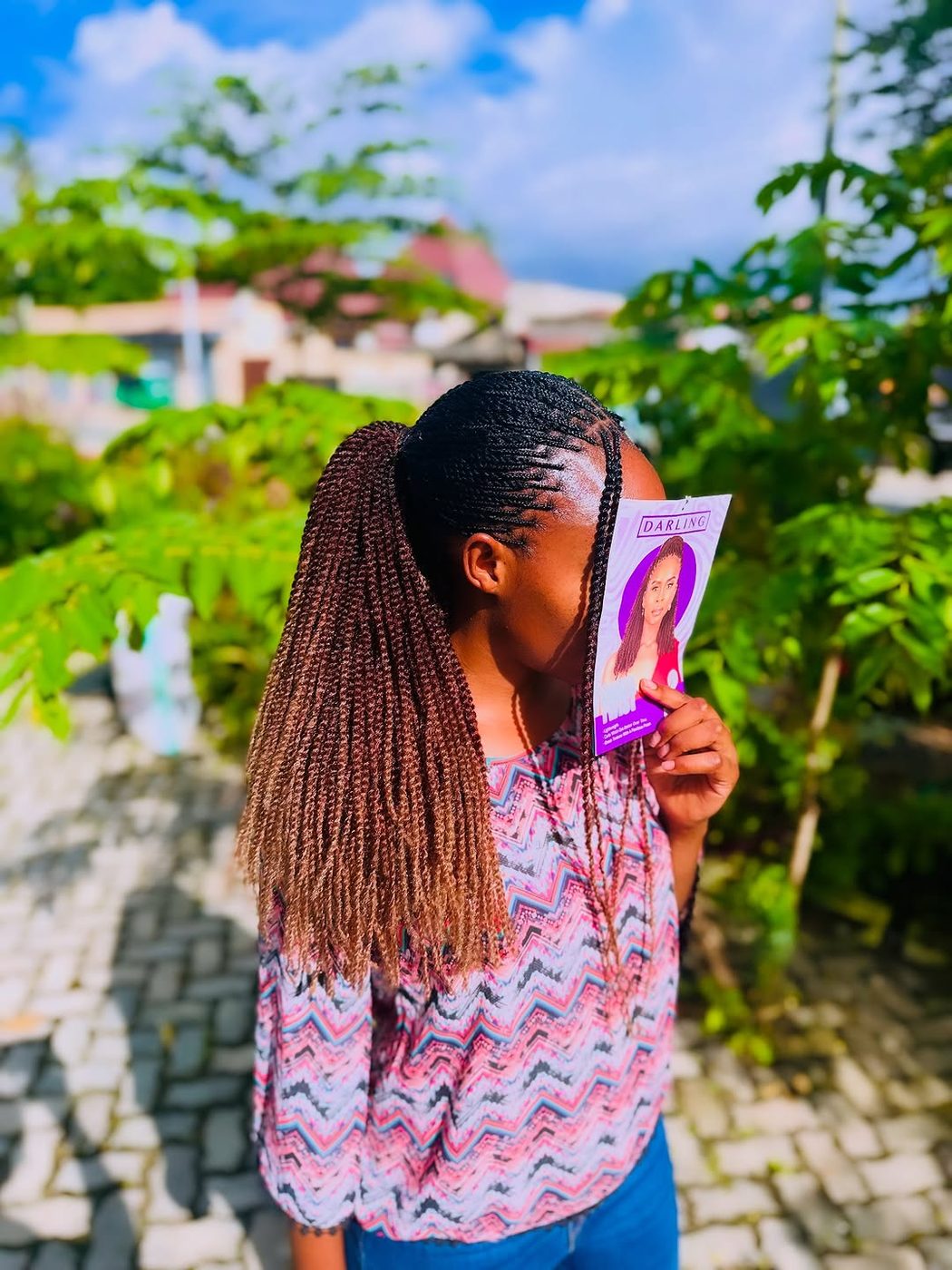 Long burgundy braids outdoor